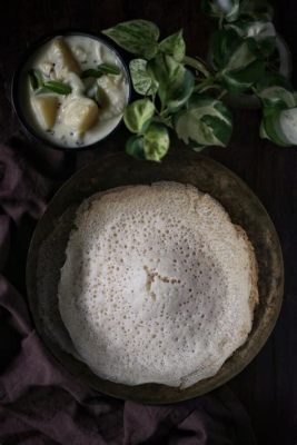  Appam: Una deliziosa combinazione di sapori croccanti e morbidezze vellutate!